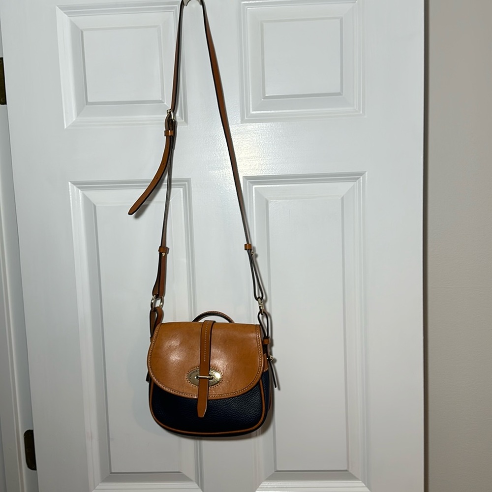 Dooney & Bourke bag.  Beautiful pebbled leather, 8 1/2 X 8.
